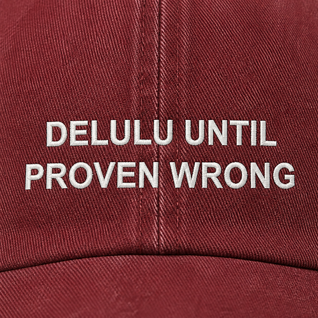 Delulu Until Proven Wrong soft white embroidery detail