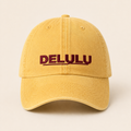 DELULU wordmark washed pale yellow cap, front