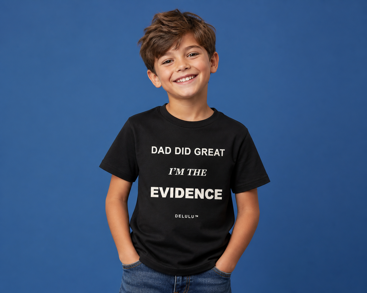 Child model wearing black Dad Did Great, I'm the Evidence kids T-shirt