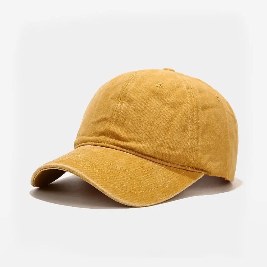Essential Washed Cap in pale yellow - front angled view