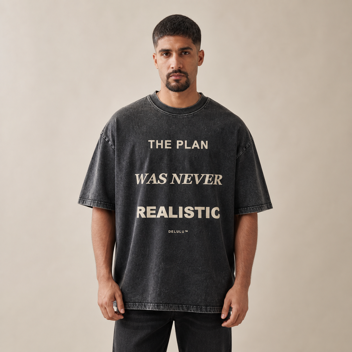 Washed charcoal The Plan Was Never Realistic Tee worn from the front