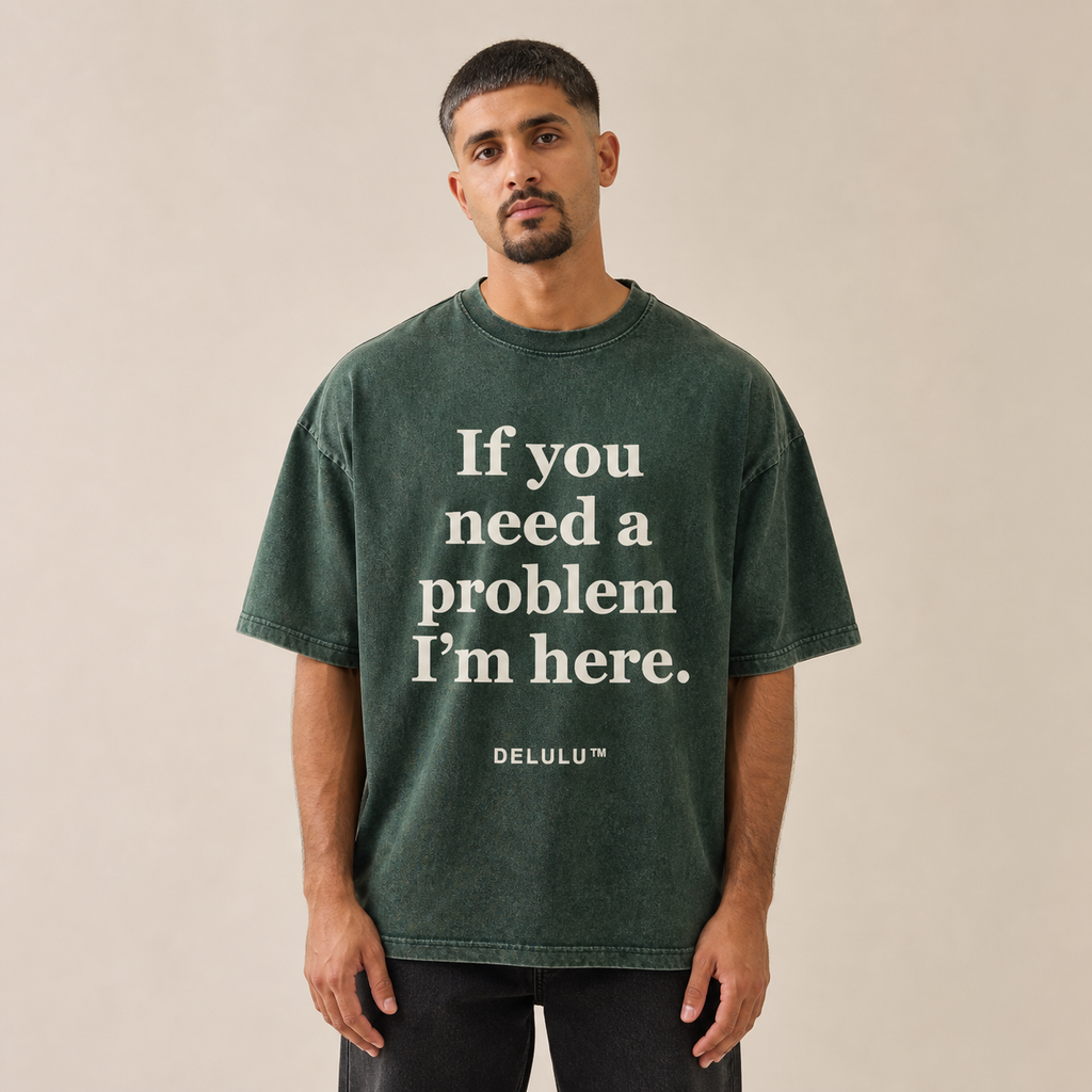 Washed hunter green If You Need a Problem Tee worn from the front