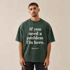 Washed hunter green If You Need a Problem Tee worn from the front